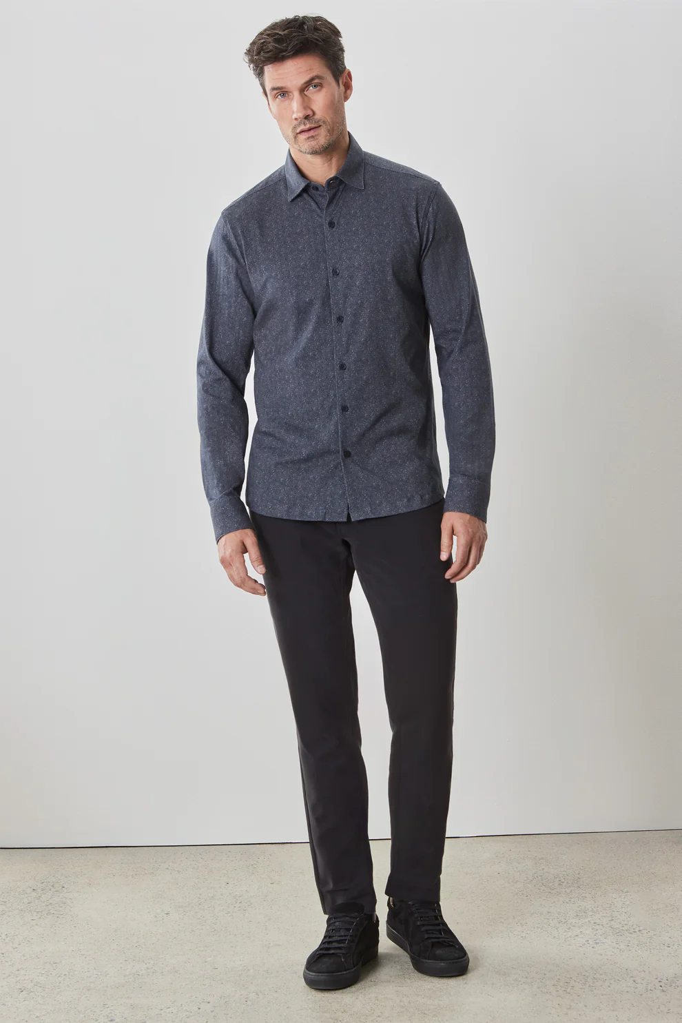 Tailored long-sleeve shirt showing precision fit and clean construction